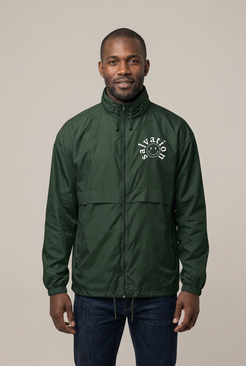 Same Black model wearing the green Trybe of Kings Salvation windbreaker